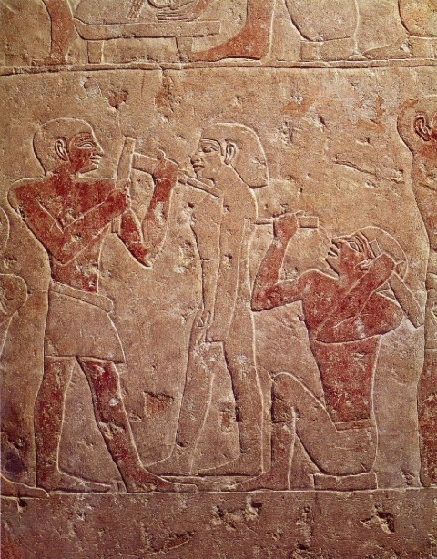 Relief depicting two sculptors carving a statue, from the mastaba of Kaemrehu, Saqqara, Old Kingdom, c.2325 BC. Painted limestone.